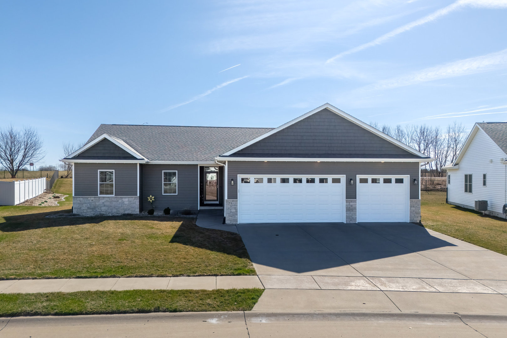 761 Sweet Wood Lane, Blue Grass, IA